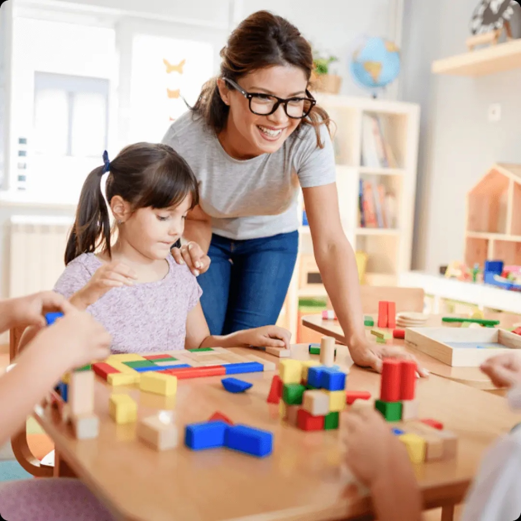 Teacher playing with child