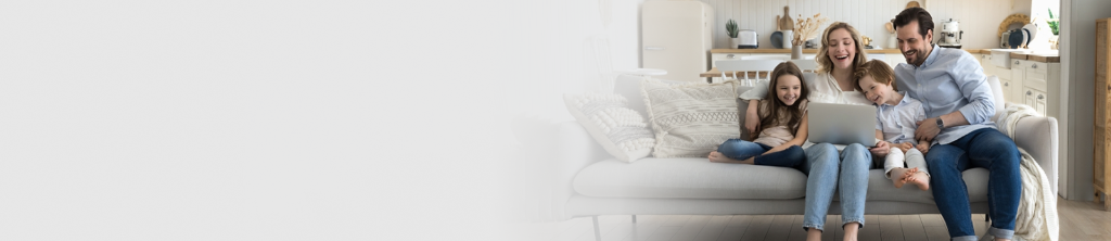 Family sitting on sofa